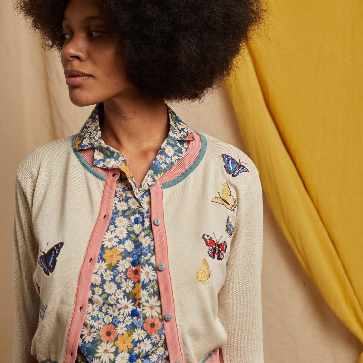 cardigan/butterflies/cream