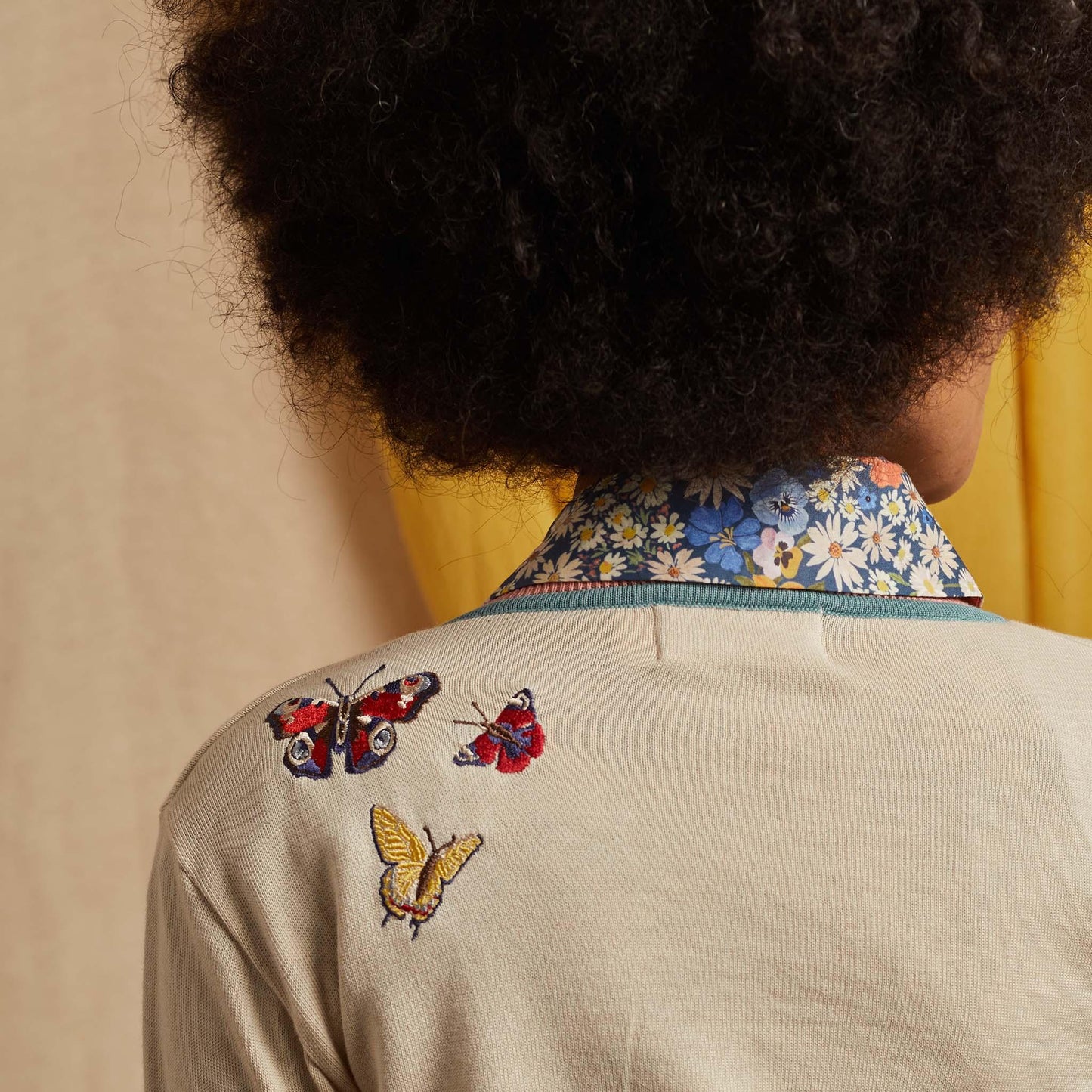 cardigan/butterflies/cream